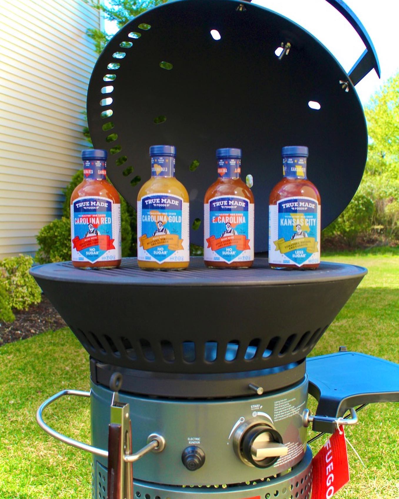 Six-pack assortment of True Made Foods BBQ sauces featuring a variety of smoky, tangy, and Carolina-style flavors.