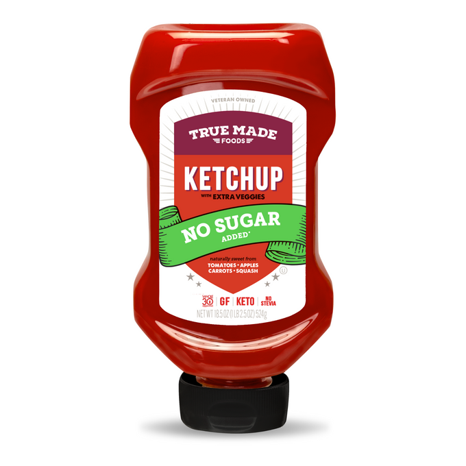 A squeeze bottle of True Made Foods No Sugar Added Ketchup on a clean white background.
