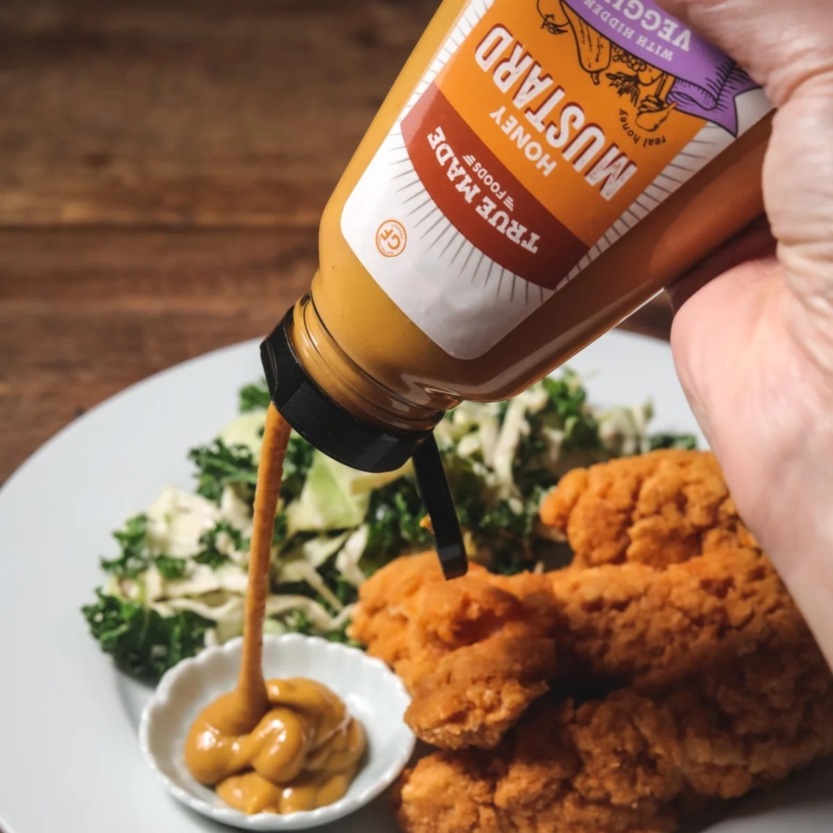 True Made Foods Honey Mustard on table with its natural ingredients